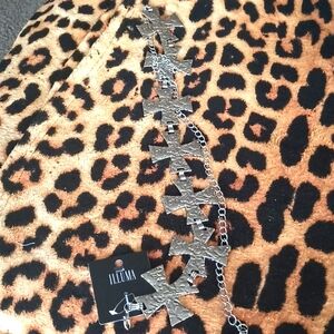 Illuma Silver Tone Cross Belt